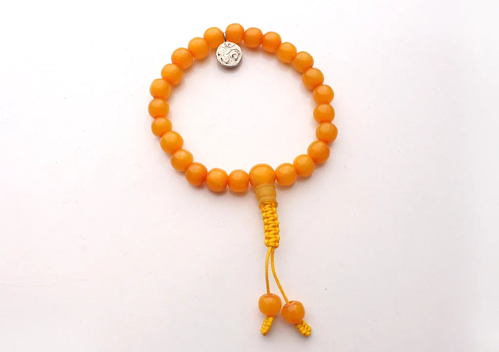 Faux Amber Beads Wrist Bracelet with Om Charm