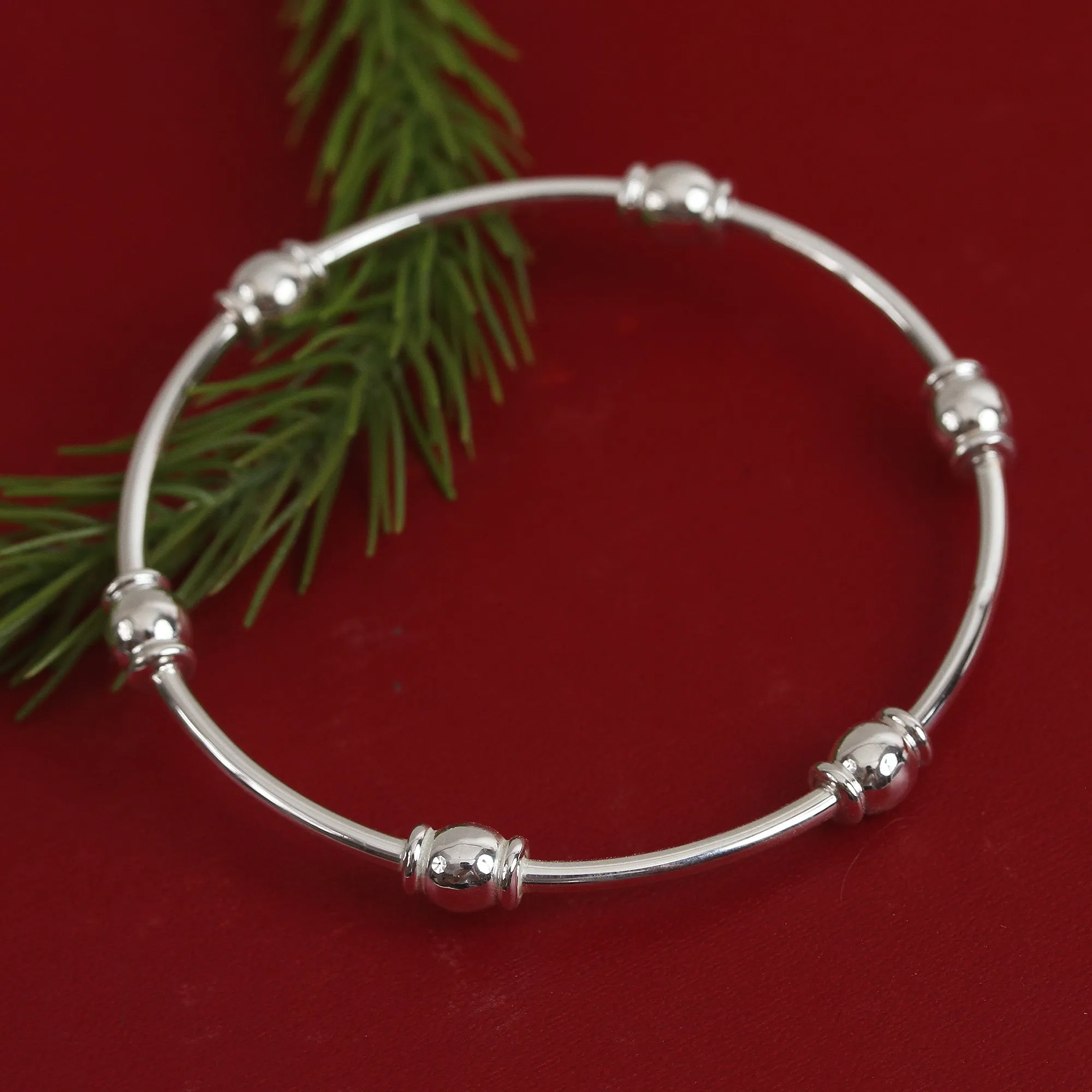 Gleaming Sterling Silver Bangle Bracelet from Mexico - Six Beads | NOVICA